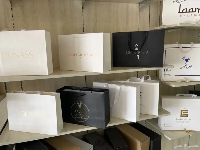 طباعه تاق ليبل قماش بوكسات عبايات اكياس علي استكر لاصق منيو 12