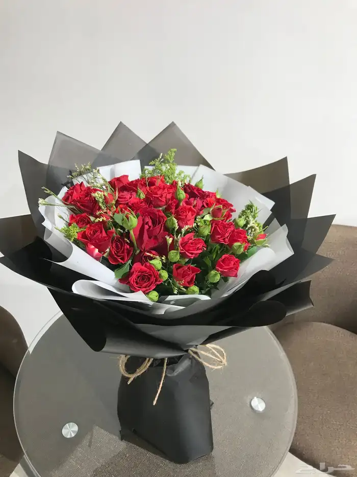 باقه ورد حب فازات طاولات 3