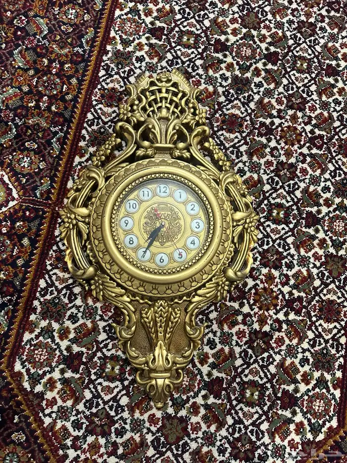 ساعه جدارية قديمة 0