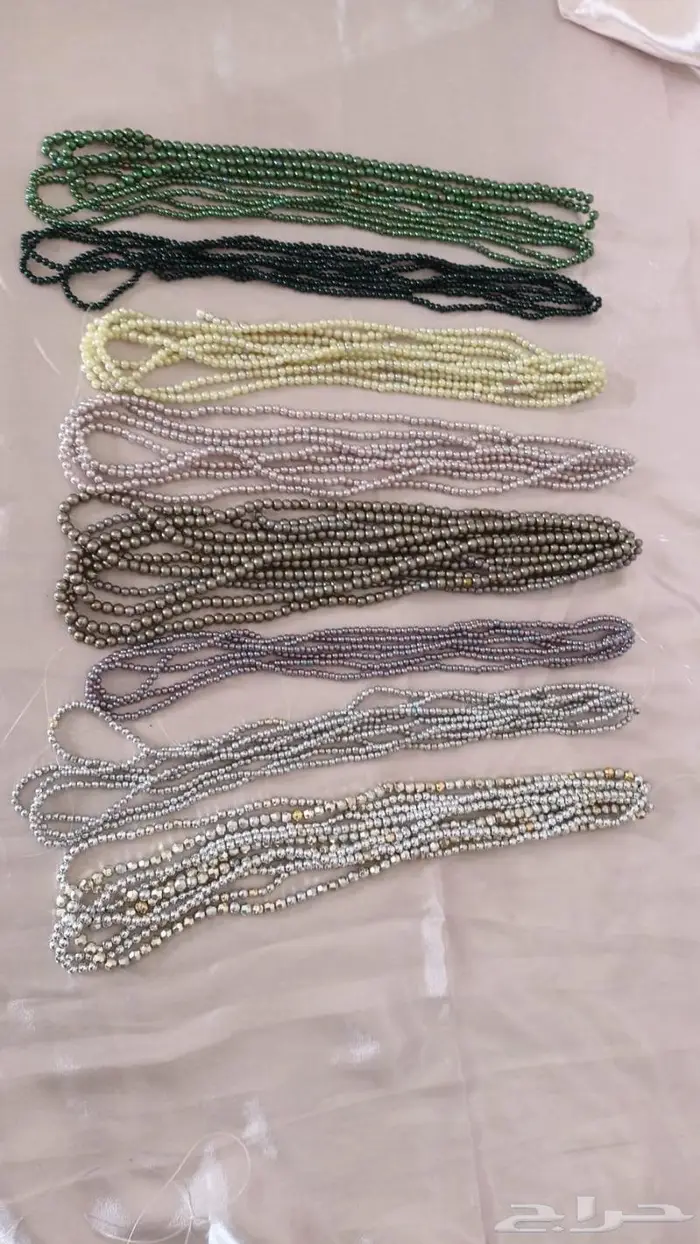 خيوط ولولو واساور وسلاسل اطواق 50