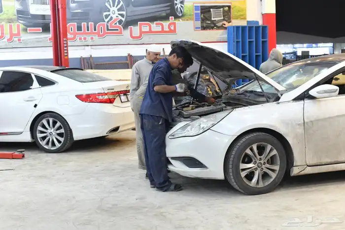 ورشة ميكانيكا و كهرباء و سمكرة لجميع انواع السيارات ب 18