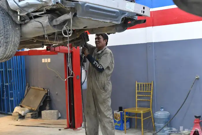 ورشة ميكانيكا و كهرباء و سمكرة لجميع انواع السيارات ب 14