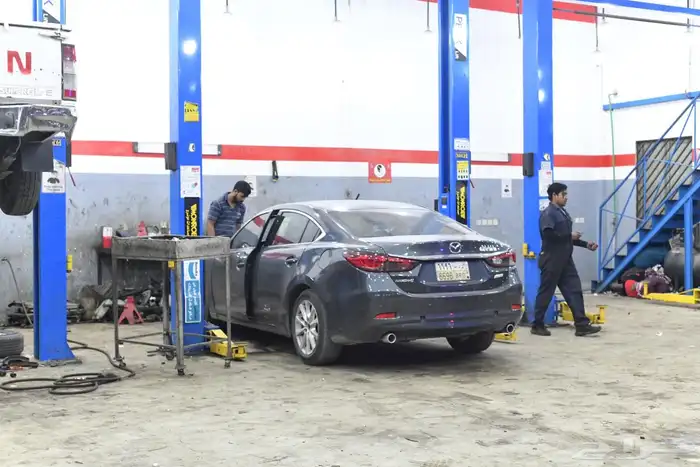 ورشة ميكانيكا و كهرباء و سمكرة لجميع انواع السيارات ب 16