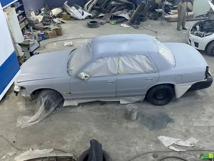 ورشة ميكانيكا و كهرباء و سمكرة لجميع انواع السيارات ب 26