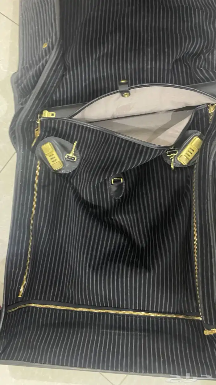 شنطه حمايه البدل والملابس 0