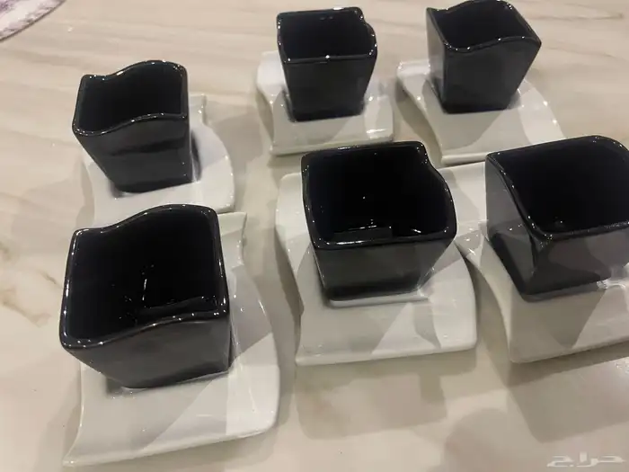 فناجين قهوة وصحون كبيرة وصحون وسط وزبادي شوربه 0