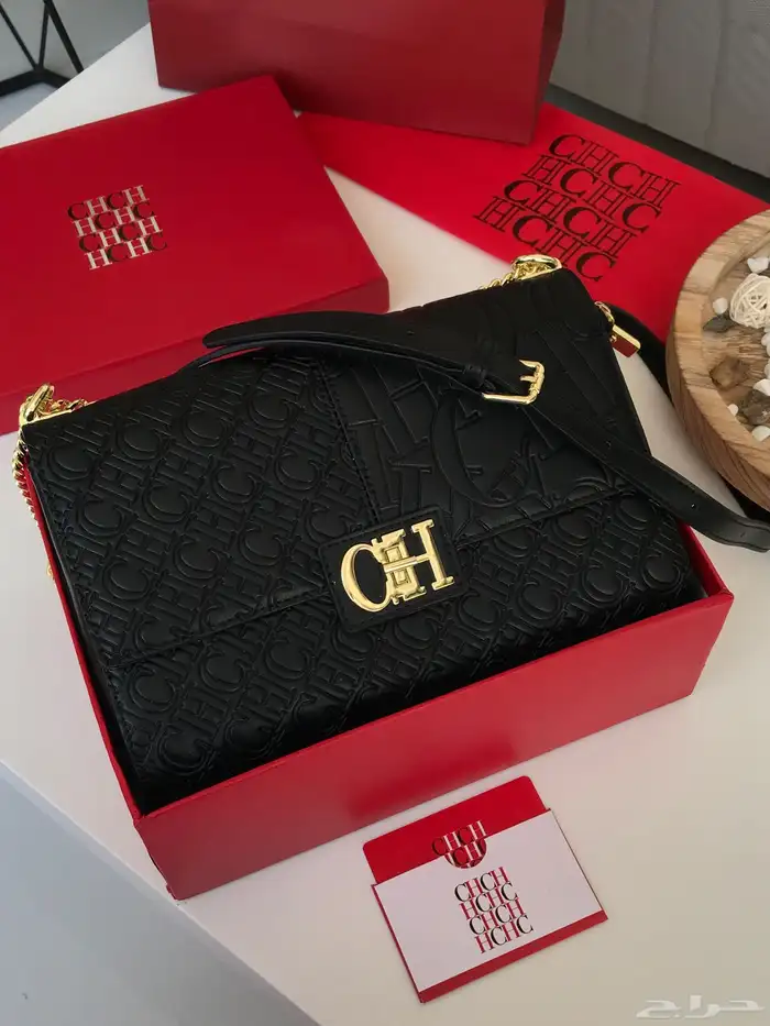 شنط مايكل كورس وكارولينا هريرا 41