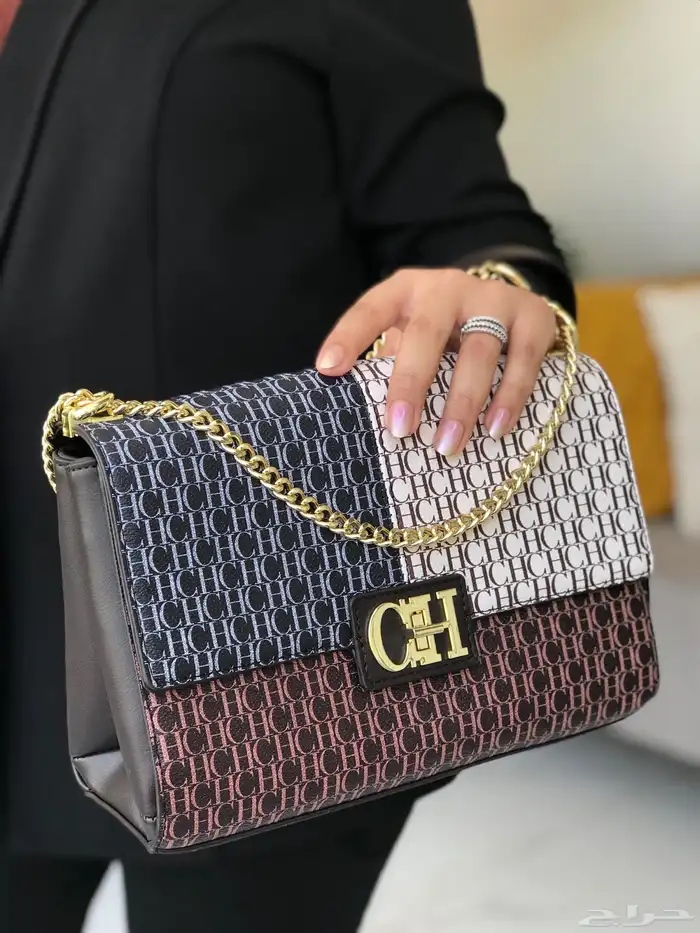 شنط مايكل كورس وكارولينا هريرا 23