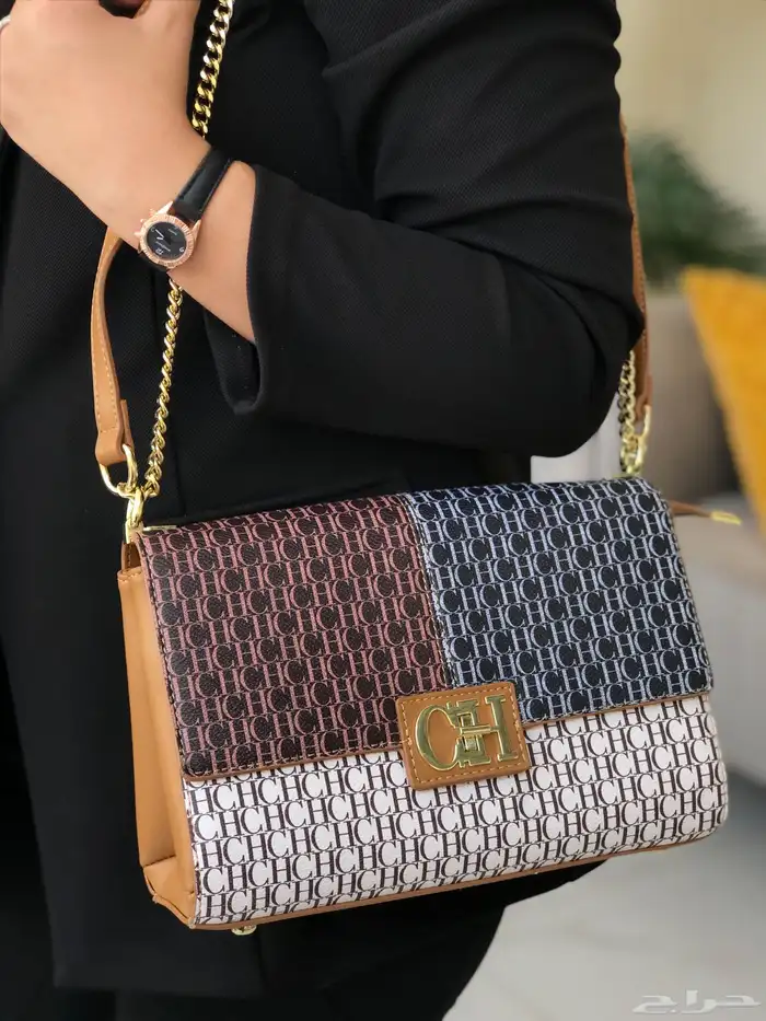 شنط مايكل كورس وكارولينا هريرا 18