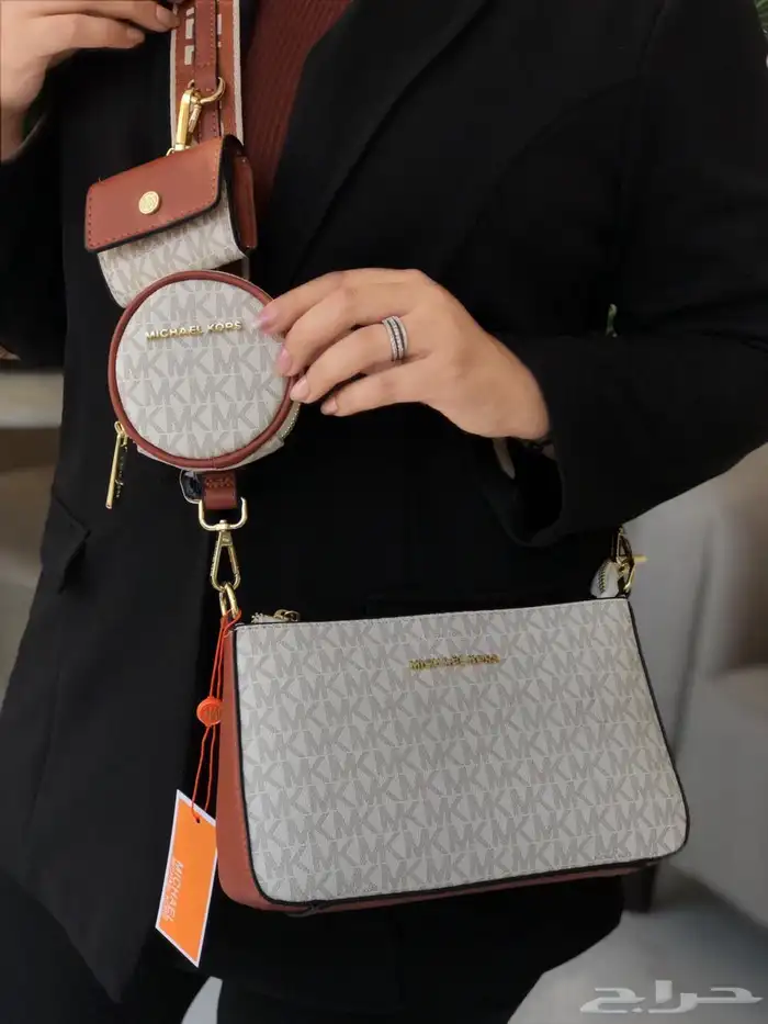 شنط مايكل كورس وكارولينا هريرا 15