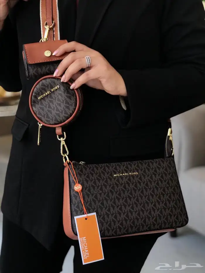 شنط مايكل كورس وكارولينا هريرا 12