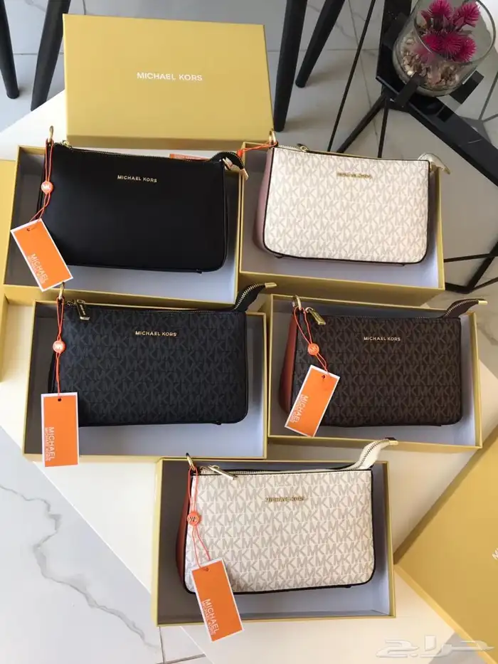 شنط مايكل كورس وكارولينا هريرا 0