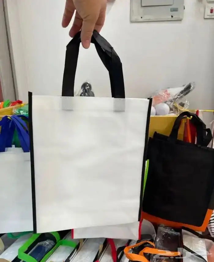 بوكسات أكياس ملونة عبايات ستكر ليبل قماش لوقو تاق كروت 65