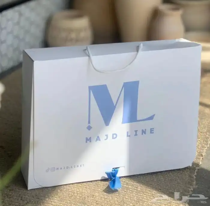 بوكسات أكياس ملونة عبايات ستكر ليبل قماش لوقو تاق كروت 40