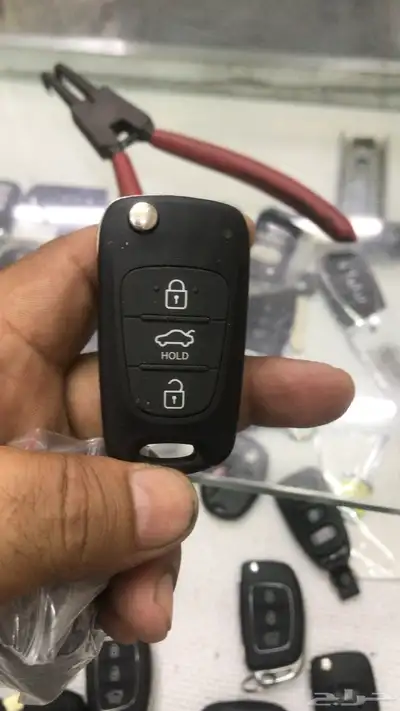 محل مفاتيح الواحة فتح سيارات شقق برمجة بصمه 14