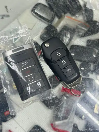 محل مفاتيح الواحة فتح سيارات شقق برمجة بصمه 2