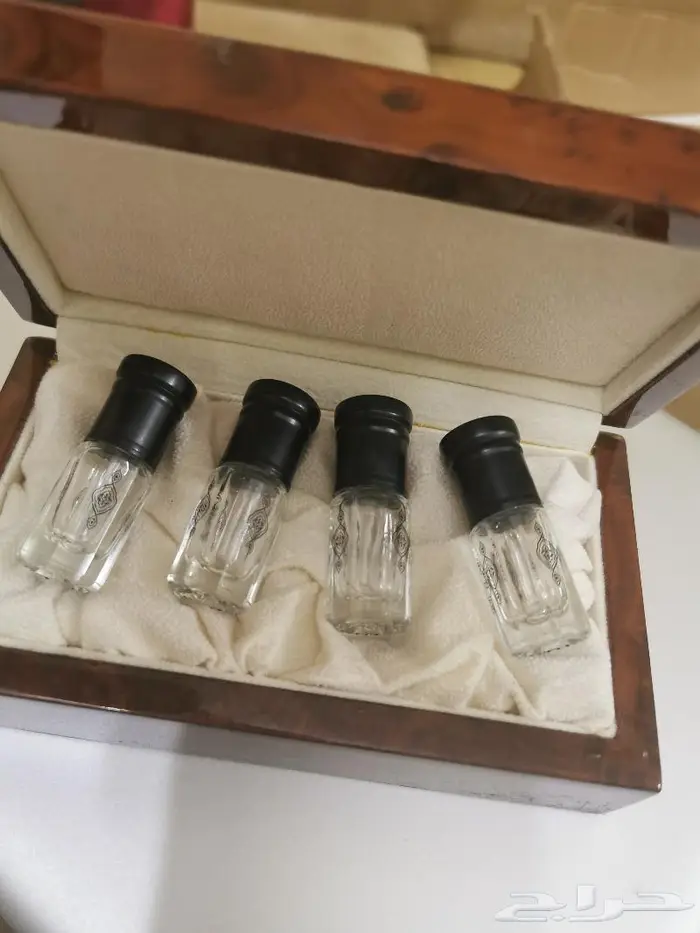 صندوق خشبي مع 4 أرباع اوقية 1