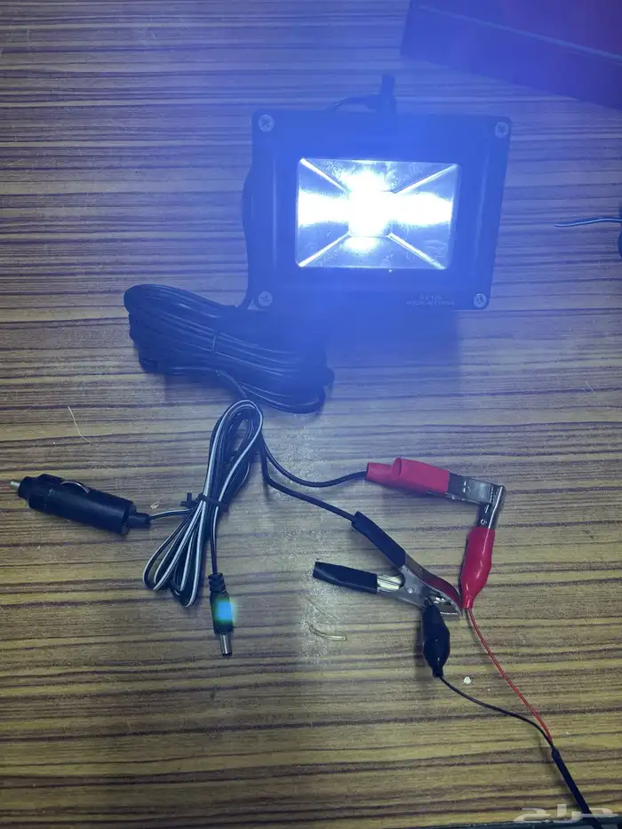 كشاف رحلا عل بطارية السياره 0