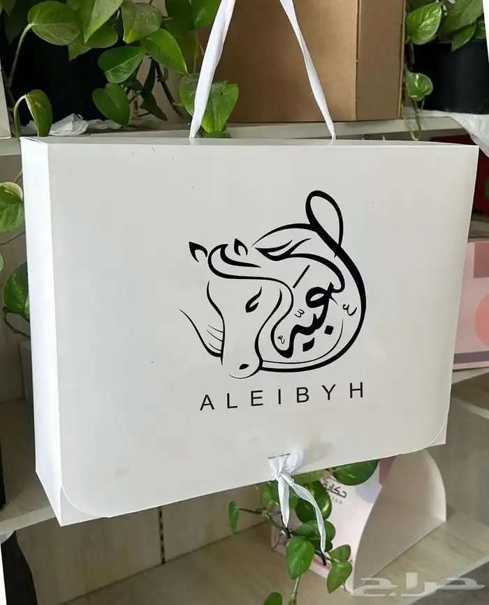 ليبل قماش لوقو جلد لوقو اكريليك بوكسات أكياس عبايات كروت 4