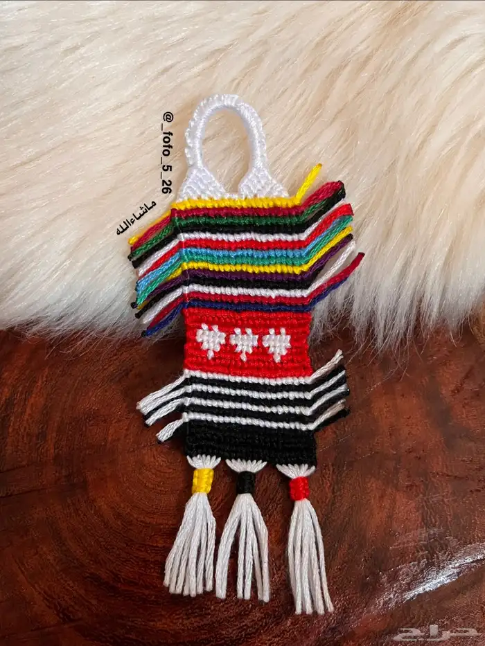 ميداليه مفاتيح نسيج العقده 0