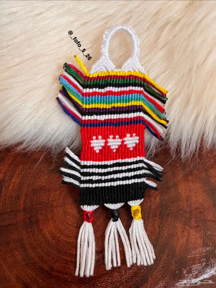 ميداليه مفاتيح نسيج العقده 1