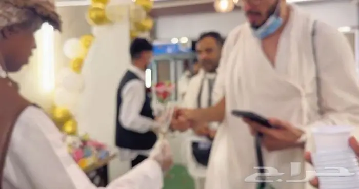 إستقبال حجاج بالأناشيد الإسلامية و موية زمزم و الورود 3