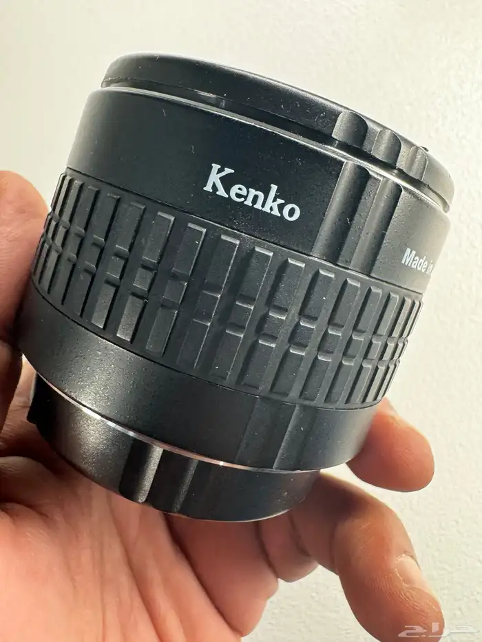 عدسة وفلاش كانون ومدبل زوم 0