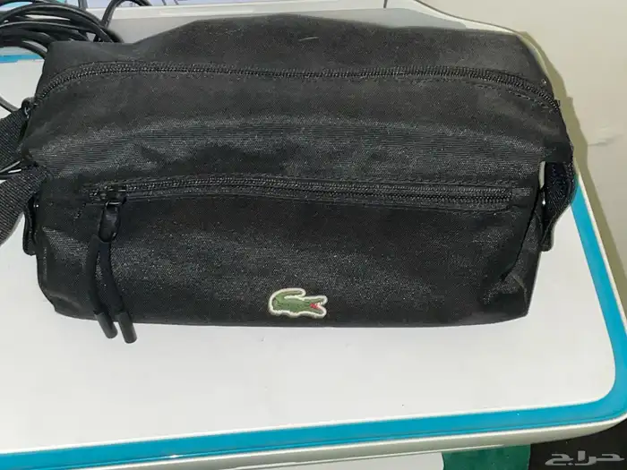 شنطة لاكوست اصليه للبيع 0