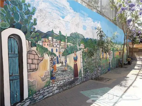 رسام جداريات وخطاط 0