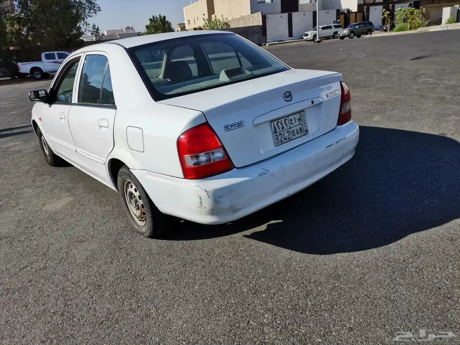 مازدا 323 ابيض .. نظيفة 1