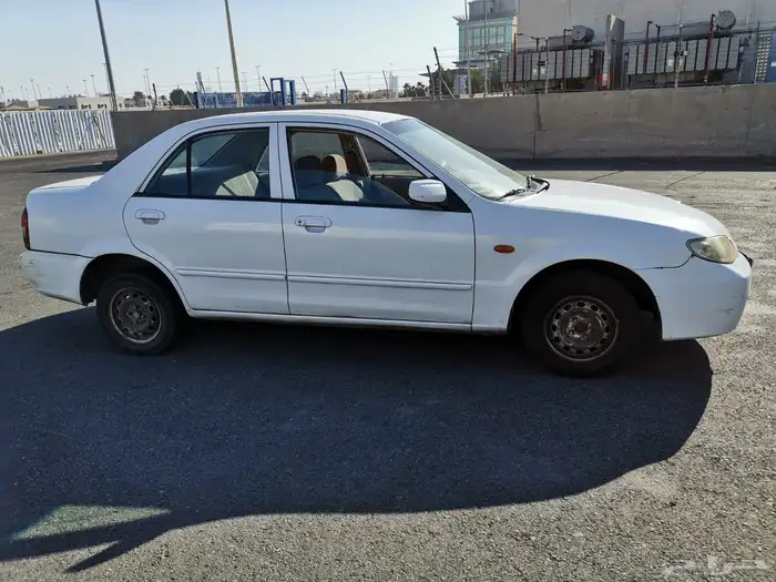 مازدا 323 ابيض .. نظيفة 3