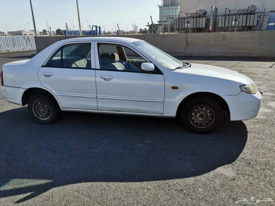 مازدا 323 ابيض .. نظيفة 4