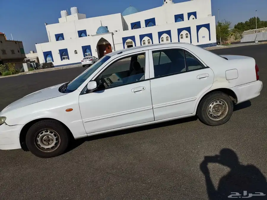 مازدا 323 ابيض .. نظيفة 2