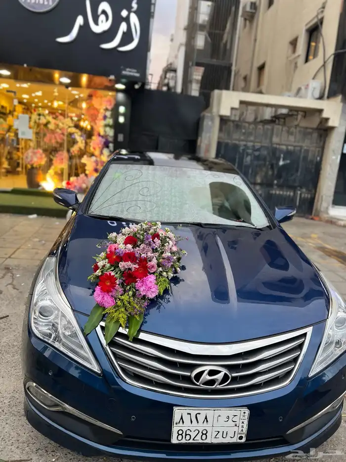 تشريع سيارات و تزيين غرف عرسان تنسيق بوكيه باقة محل ورد 12