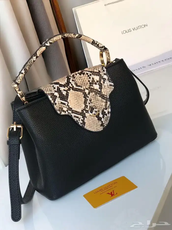 شنط لويس فيتوه بأسعار مخفضه مع الملحقات 1