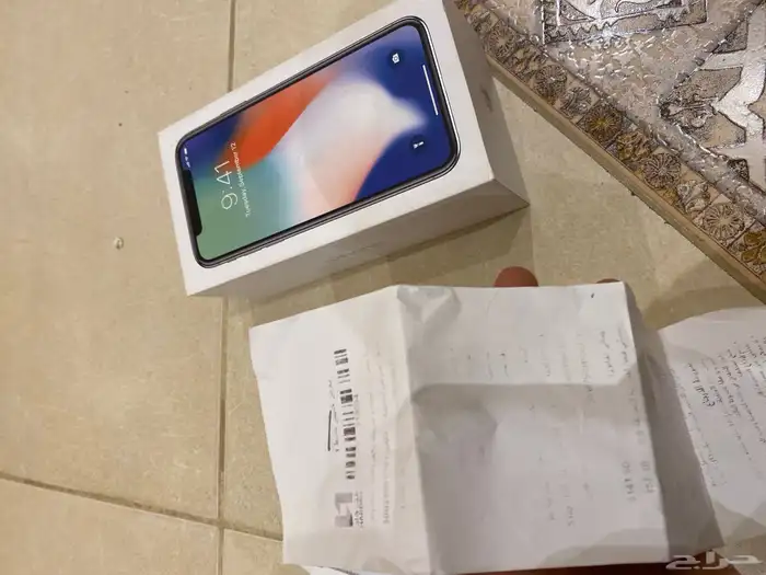 ايفون X مع فاتورت الشراء والصندوق حقة 9