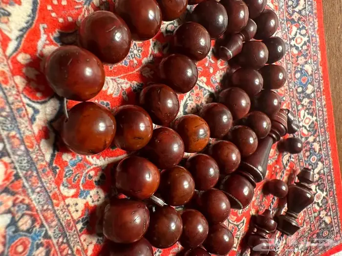 ((تم البيع))مسباح خشب كوك قديم جدا مطعم فضة 0