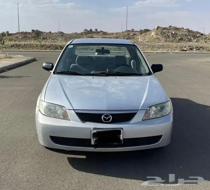 للبيع مازده سيدان وكاله او البدل بهايلكس من 2002 الي 2005 7