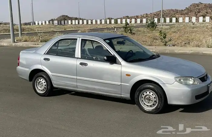للبيع مازده سيدان وكاله او البدل بهايلكس من 2002 الي 2005 0
