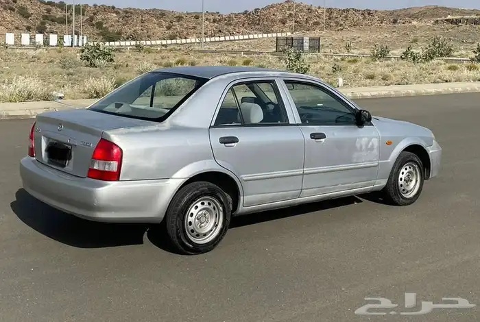 للبيع مازده سيدان وكاله او البدل بهايلكس من 2002 الي 2005 4