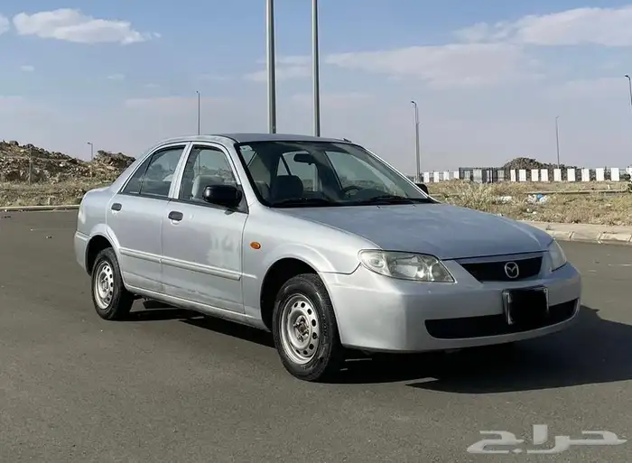 للبيع مازده سيدان وكاله او البدل بهايلكس من 2002 الي 2005 3