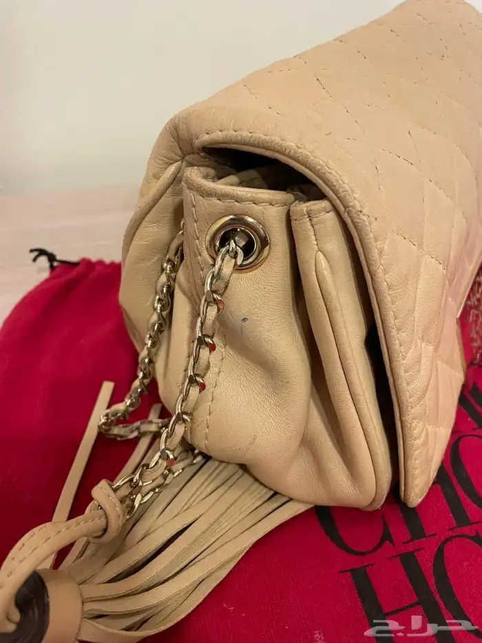 شنطة اصلية ماركة CH كارولينا هريرا (مستعمله نظيفه) 0