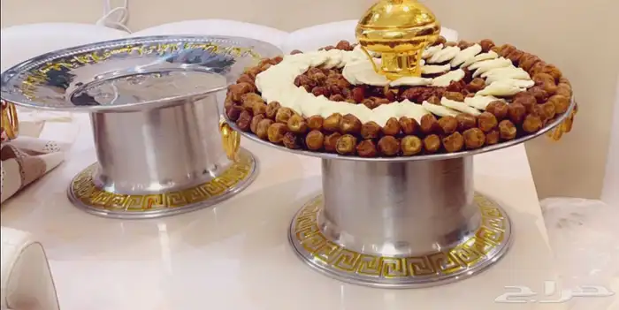 تجهيز صواني تمر ومضير وسمن مع الدخن 4
