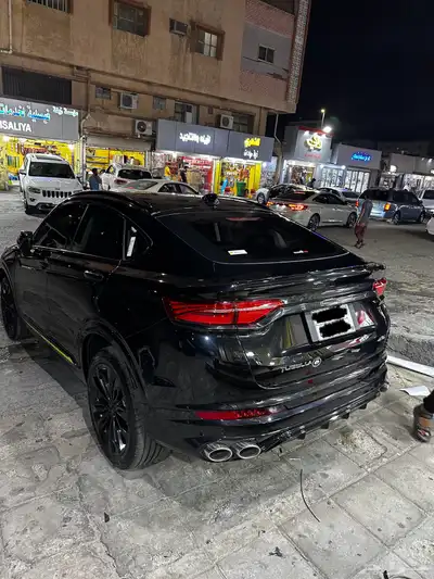 جيلي توغيلا 2024 فل بالكامل لون اسود 4x4 1