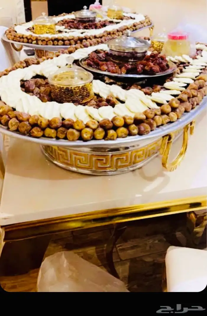 تجهيز صواني تمر ومضير وسمن مع الدخن 3
