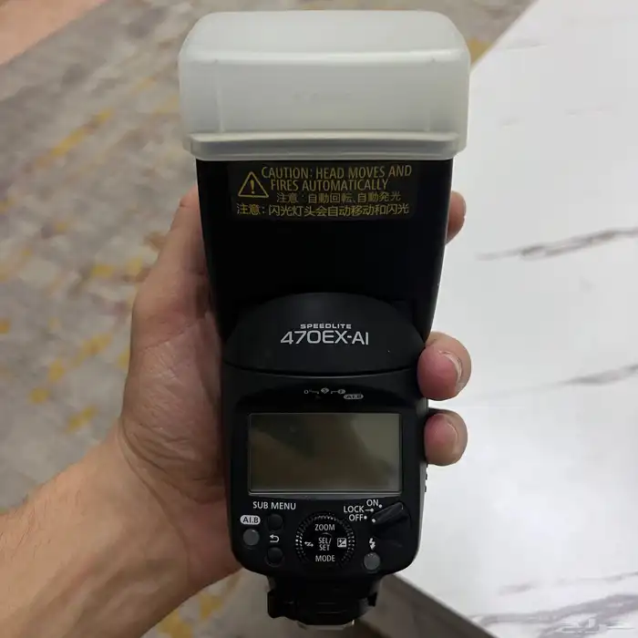فلاش Canon Speedlite 470EX مع شنطه كاميرات و ذاكره تخزين 1