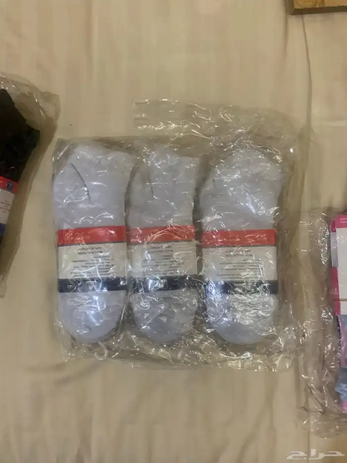 ملابس جنز و قمصان و قبوع و شرابات 49