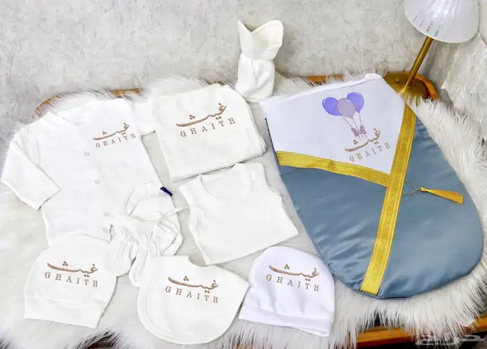 طقم مواليد مطرز حسب الطلب 5