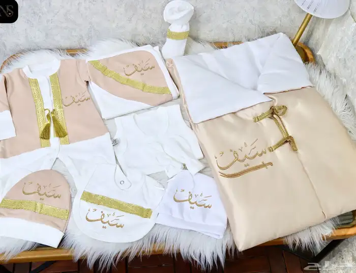 طقم مواليد مطرز حسب الطلب 9