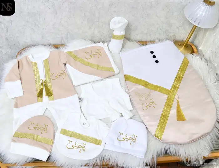 طقم مواليد مطرز حسب الطلب 11